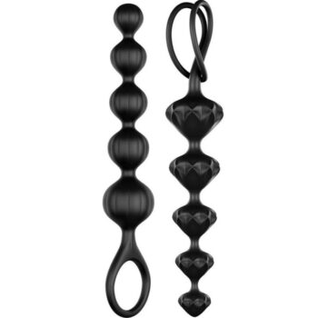 Dettaglio texture Satisfyer Love Beads: sfere scanalate e diamante sfaccettato