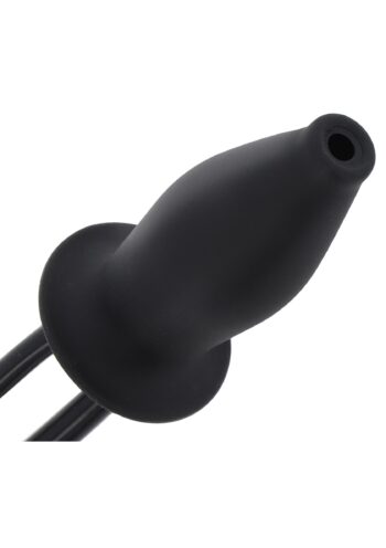 Dettaglio del foro di uscita del lubrificante sulla punta del plug